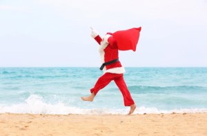a person flying through the air on a beach