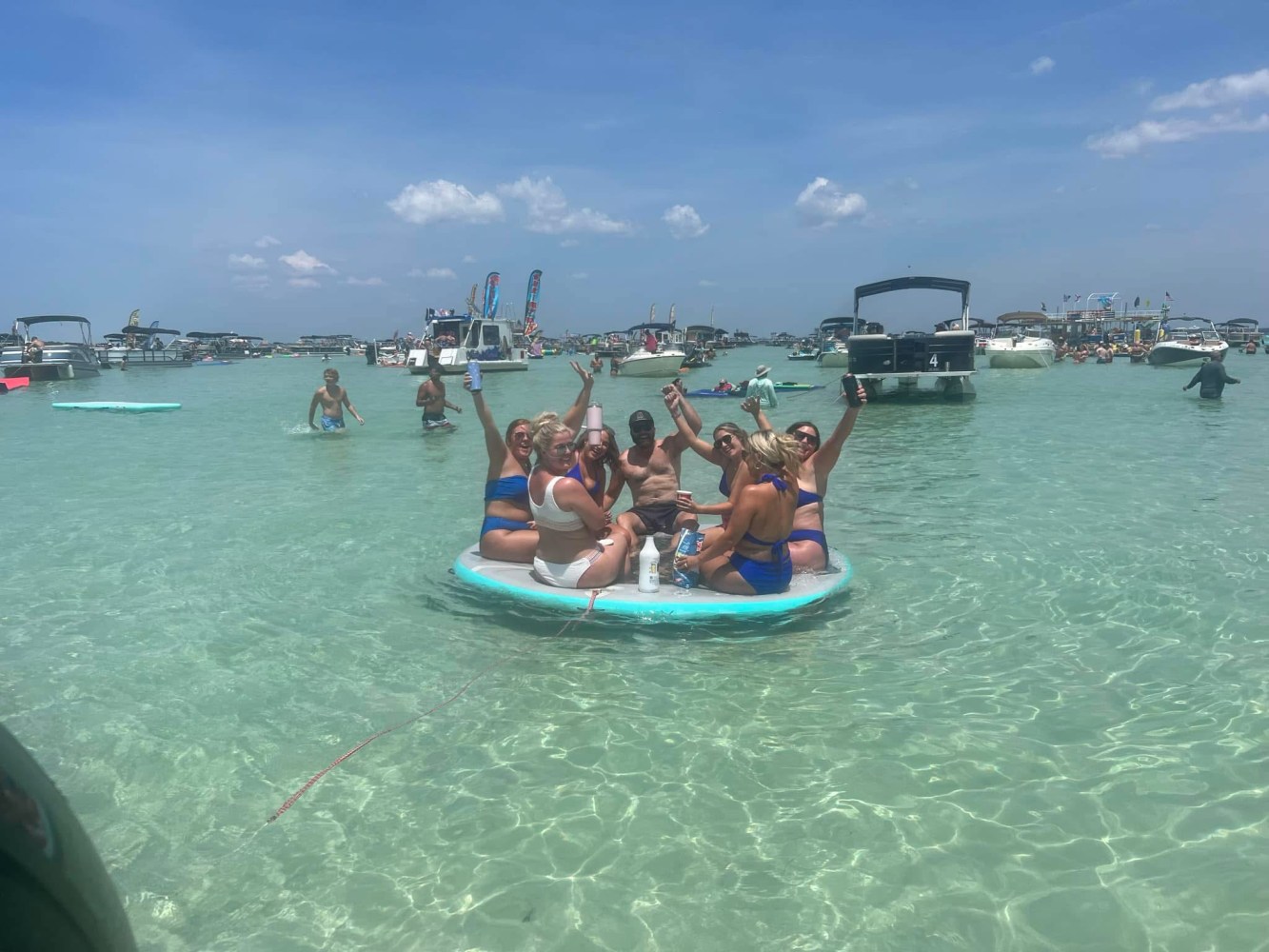 a group of people swimming in a body of water